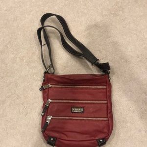 Tignanello convertible crossbody red leather handbag with tons of storage.